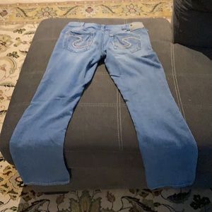 Silver jeans ( the jogs jeans, super comfy!). Size 31/33